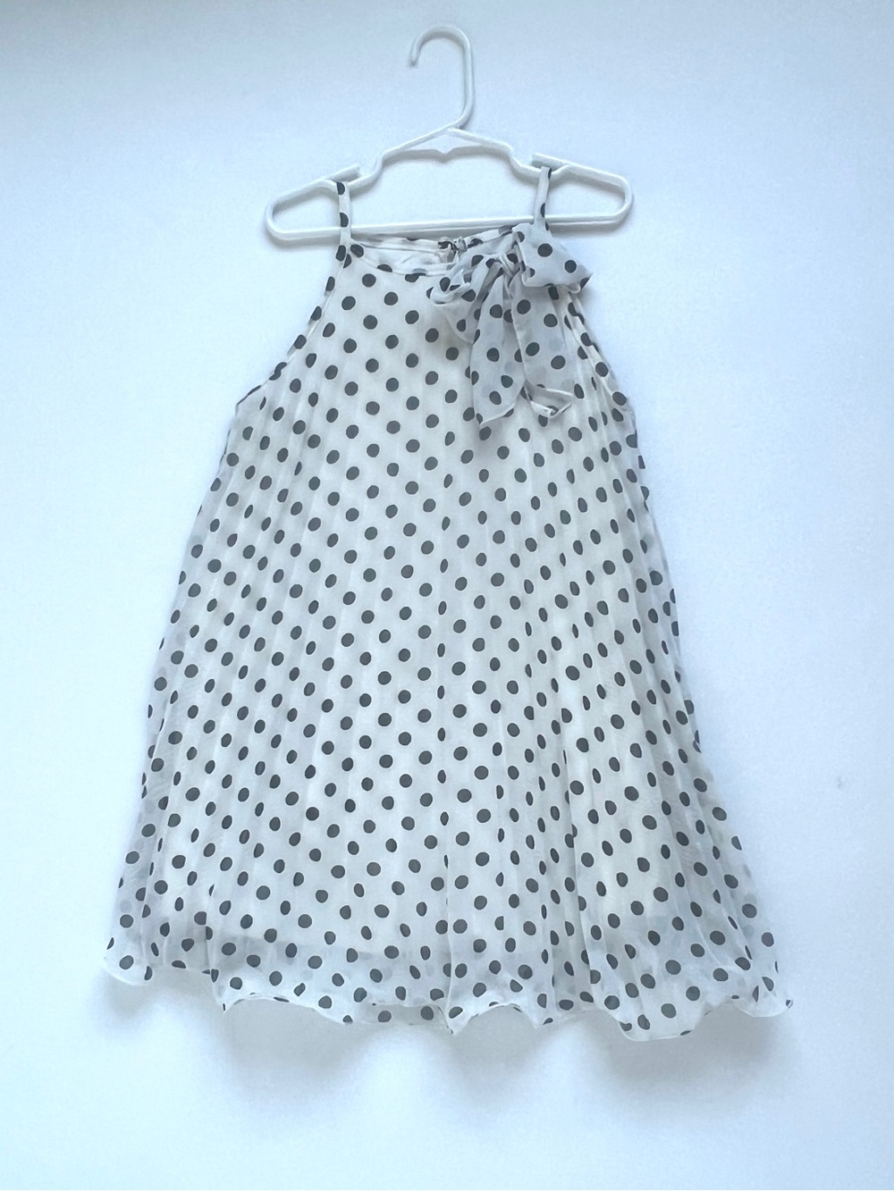 Girls White Polka Dot Bow Dress. Approximately 5/6 size